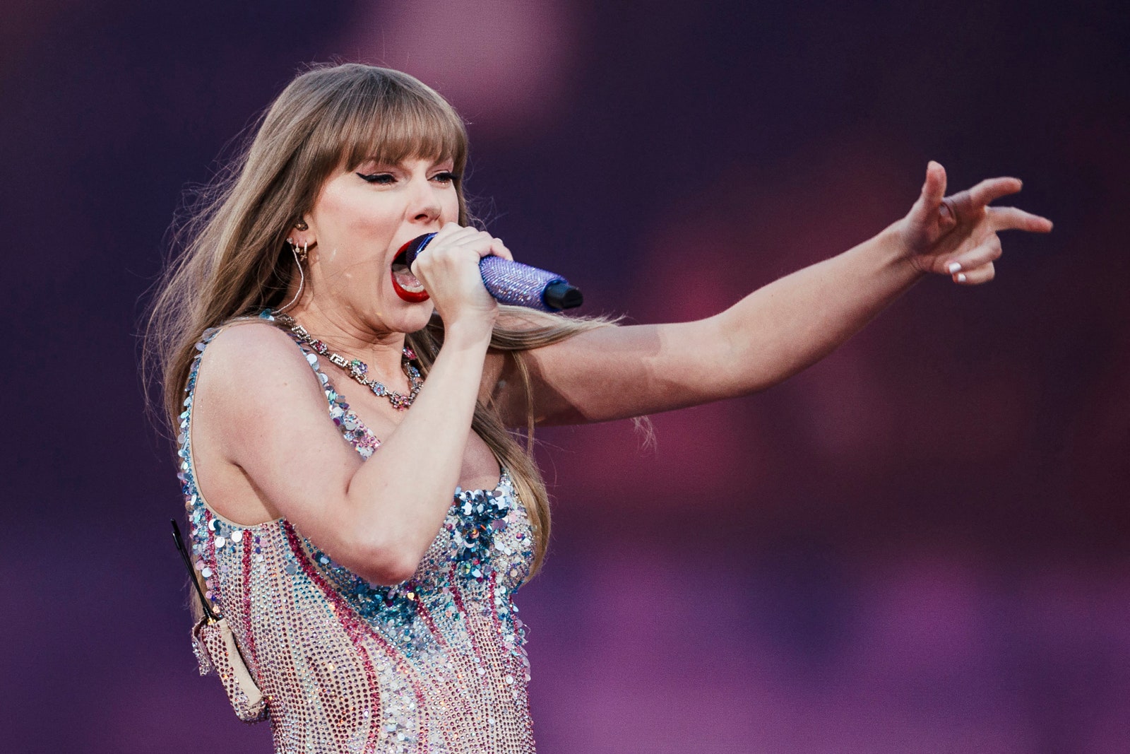 Image may contain Taylor Swift Performer Person Solo Performance Electrical Device Microphone Accessories and Jewelry