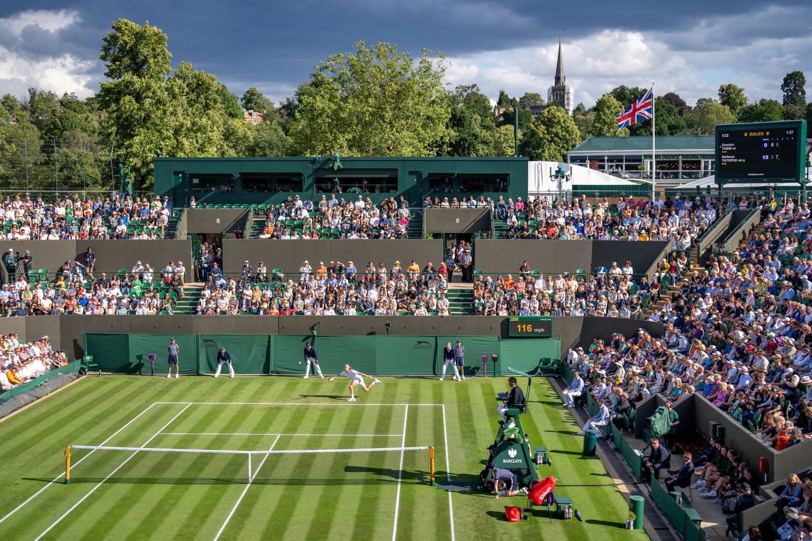 Image may contain Flag Person Sport Tennis Accessories Bag and Handbag