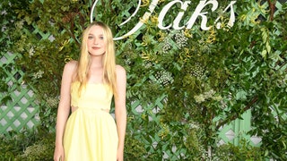 Image may contain Dakota Fanning Clothing Dress Blonde Hair Person Adult Formal Wear Face Head and Photography