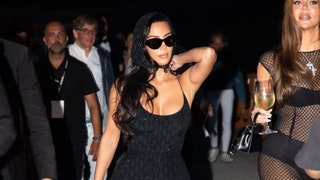 Image may contain Huda Kattan Clothing Footwear Shoe Accessories Glasses Fashion Adult Person Bag and Handbag