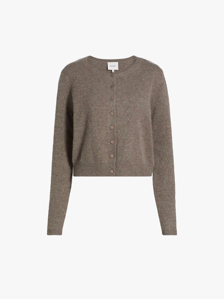 Image may contain Clothing Knitwear Sweater and Cardigan