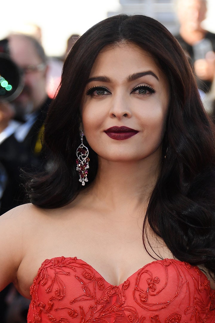 Image may contain Human Person Fashion Premiere Aishwarya Rai Clothing Apparel Plant Evening Dress Robe and Gown