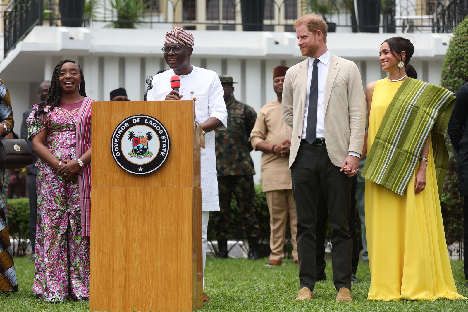 Image may contain Prince Harry Duke of Sussex Meghan Duchess of Sussex Crowd Person Accessories Formal Wear and Tie