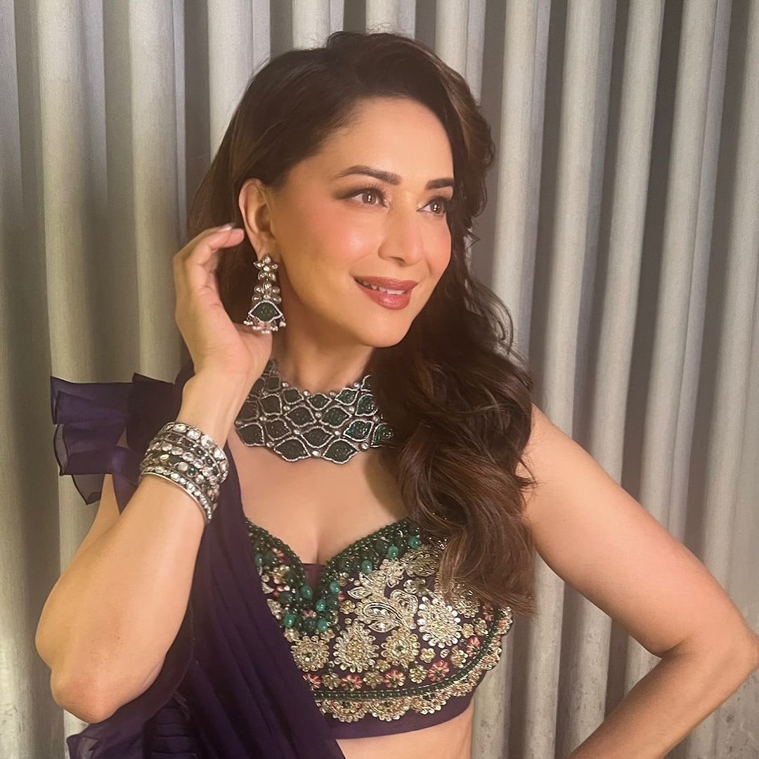 Madhuri Dixit Nene channels classic glam with soft waves and luminous skin