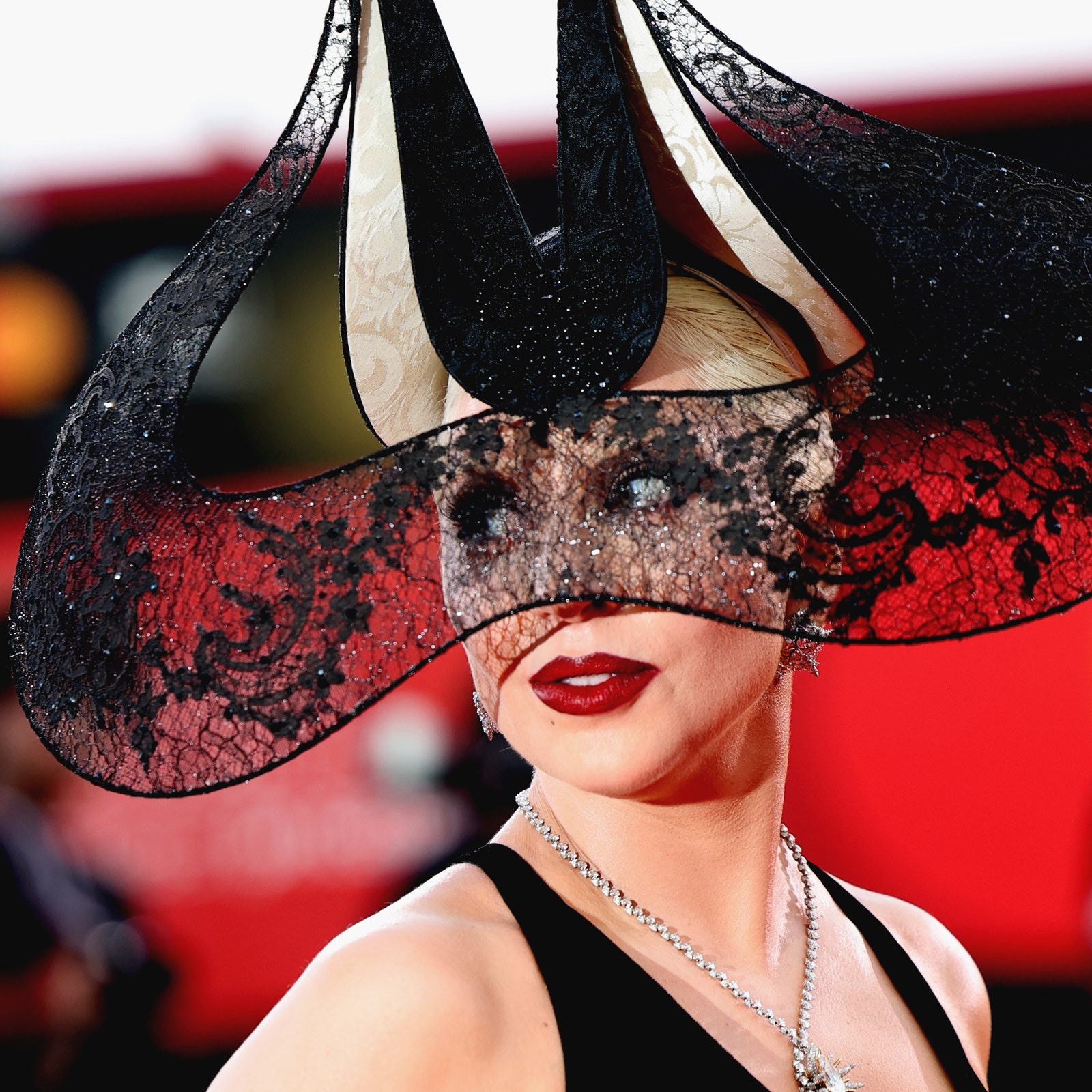 Michael Polansky may be looking at Lady Gaga, but we're looking at that headpiece