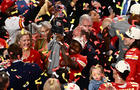 Kansas City Chiefs' wide reciever #12 Mecole Hardman holds the trophy after winning Super Bowl LVIII 