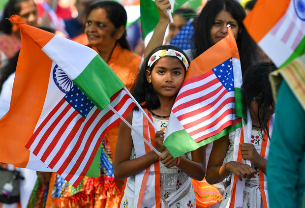 Nine-year-old Shatki Desai walks with her family during the 