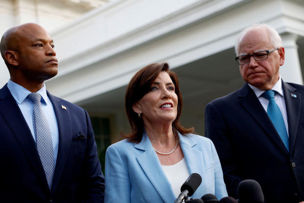 From left, Govs. Wes Moore of Maryland, Kathy Hochul of New York and Tim Walz of Minnesota speak to reporters after a meeting with President Biden at the White House on July 3, 2024. 