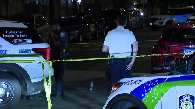 Crime scene tape blocks off a street in the Bronx. 