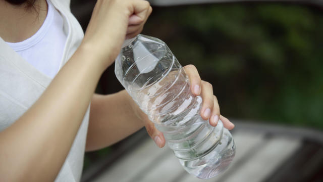 Packaging of plastic bottles with mineral water - Close up. 