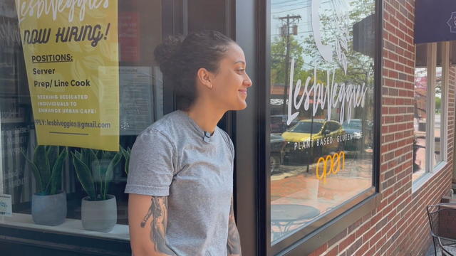 Owner Brennah Lambert stands near her LesbiVeggies cafe 