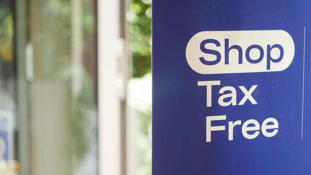 shop tax free text duty free shop sign on shop window 