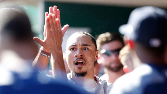 mookie-high-5s-teamates-after-scoring-the-game-winning-run.jpg 