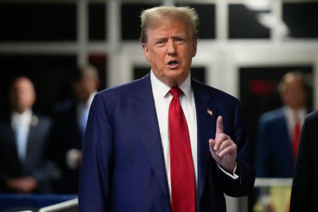 Former President Donald Trump speaks to the media as he arrives to court during his trial at Manhattan Criminal Court on April 30, 2024 in New York City. 