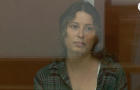 Ksenia Karelina, a dual U.S.-Russian national detained on suspicion of treason, attends a court hearing in Yekaterinburg 