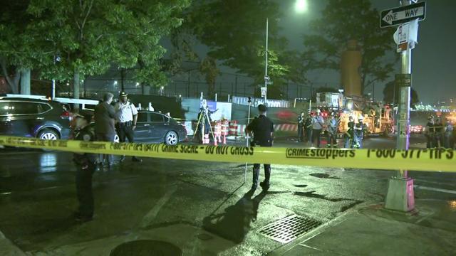 Crime scene tape blocks off a street on the Lower East Side where police are investigating. 