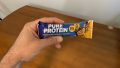 Our tester holding a Pure Protein Bar.