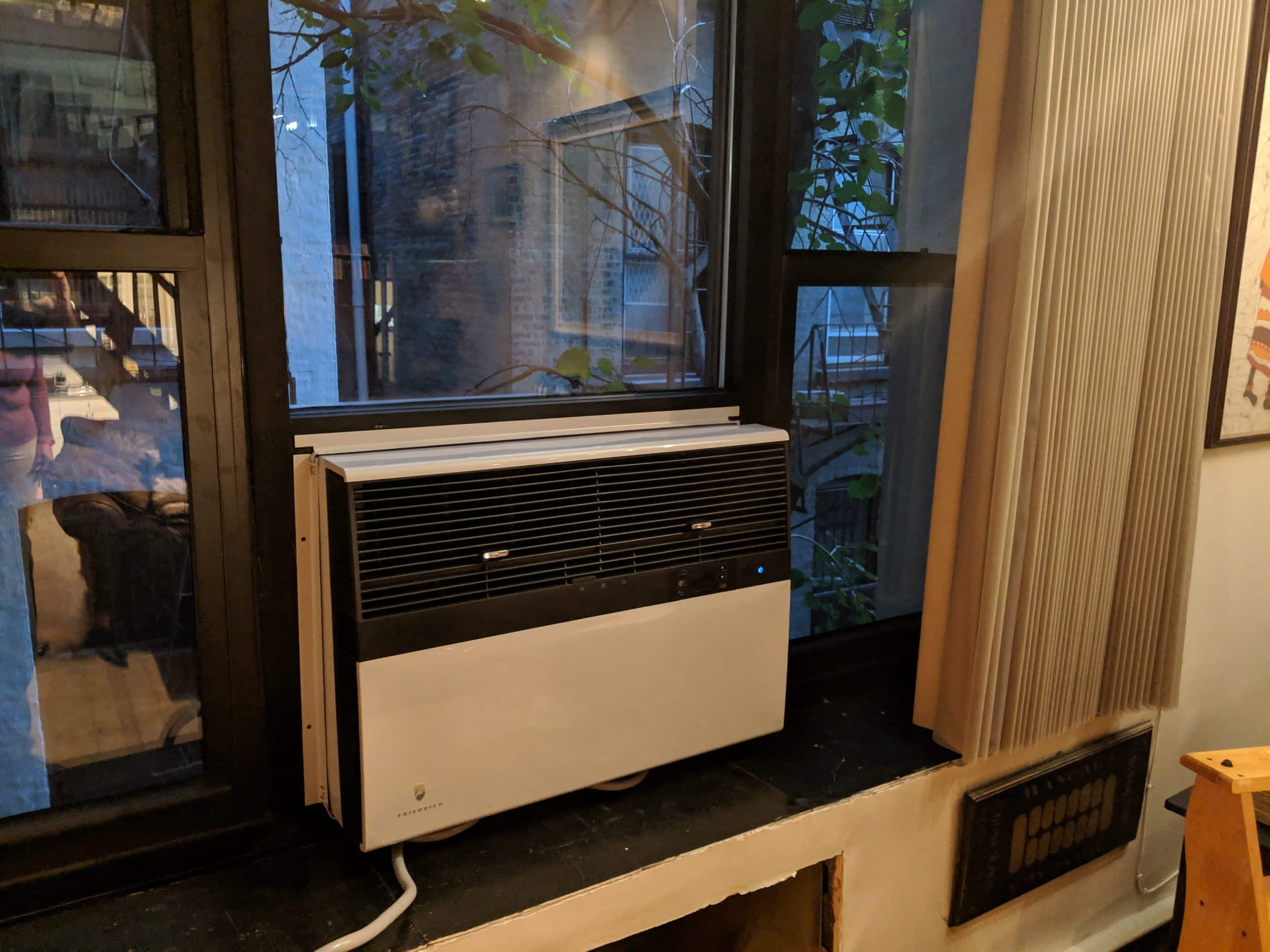 A window AC installed in the window