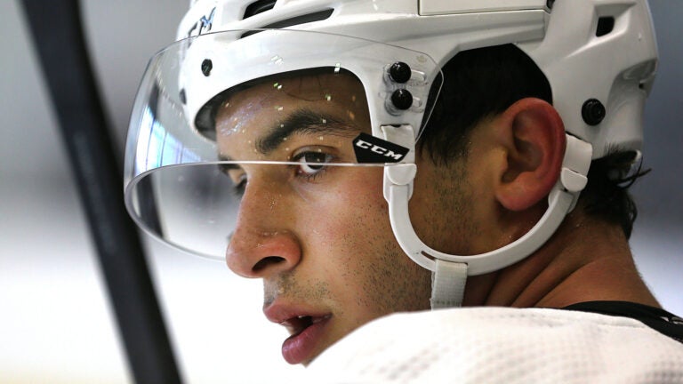 The Boston Bruins held their development camp at Warrior Ice Arena. Matt Poitras takes a breather.