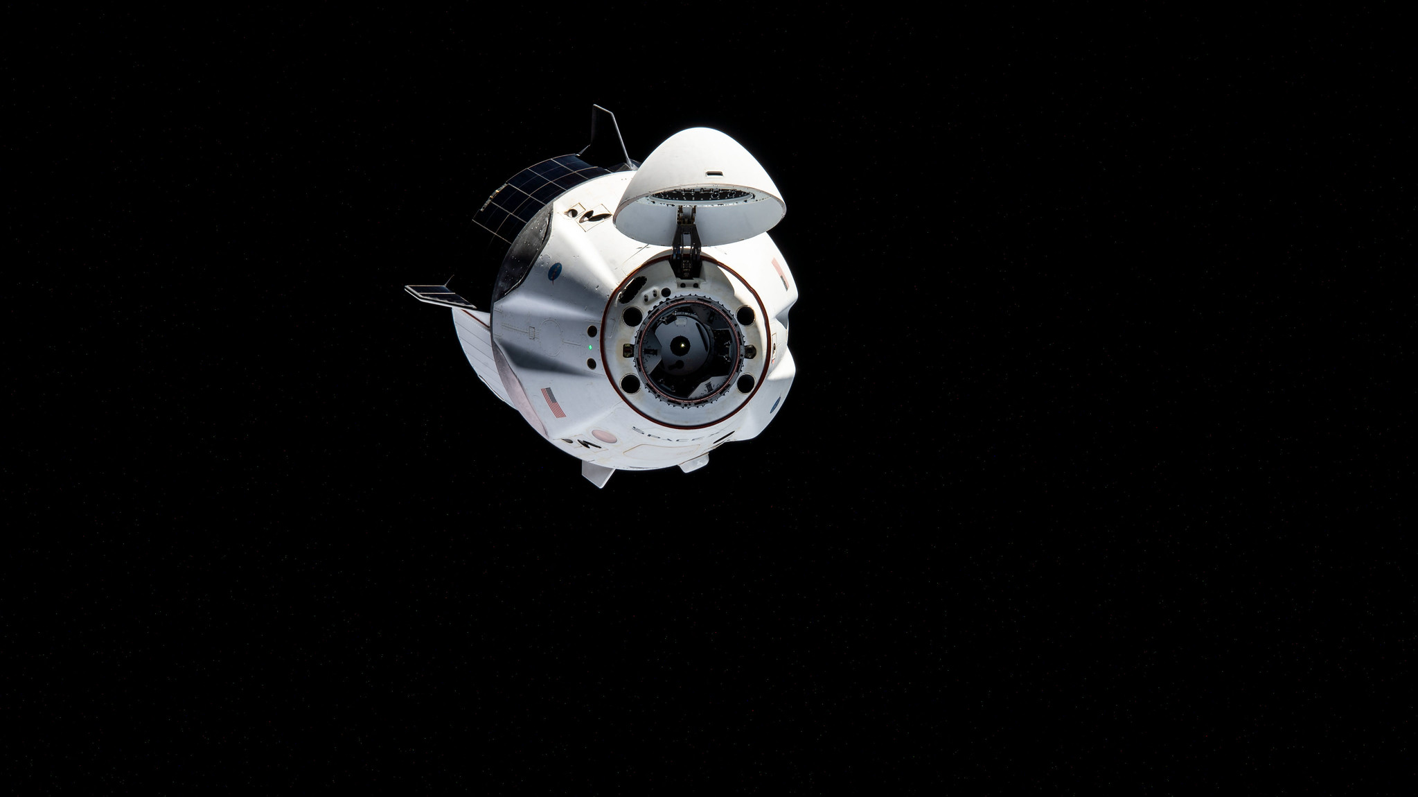 The SpaceX Crew-1 Dragon maneuvers to another port on the International Space Station on April 5, 2021