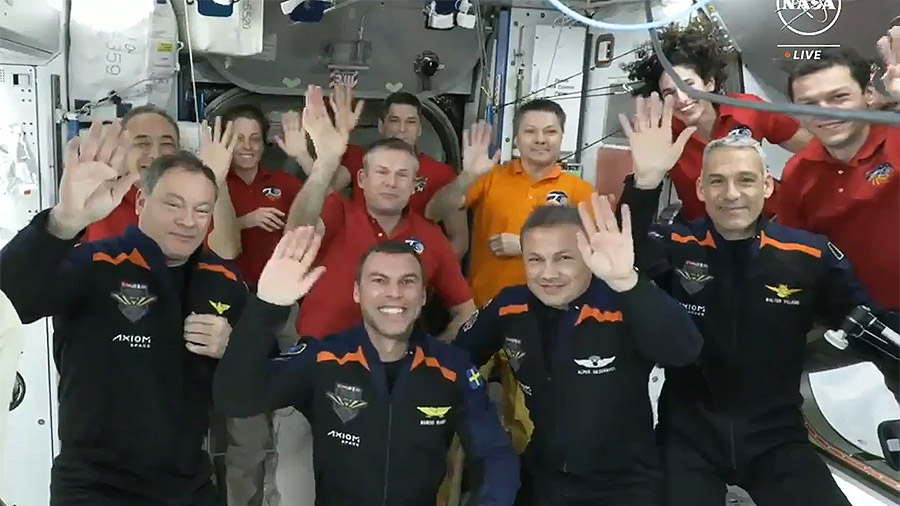 The four Axiom Mission 3 astronauts (front row) and the seven Expedition 70 crew members wave to the camera following a crew greeting ceremony on Jan. 20, 2024. Credit: NASA TV