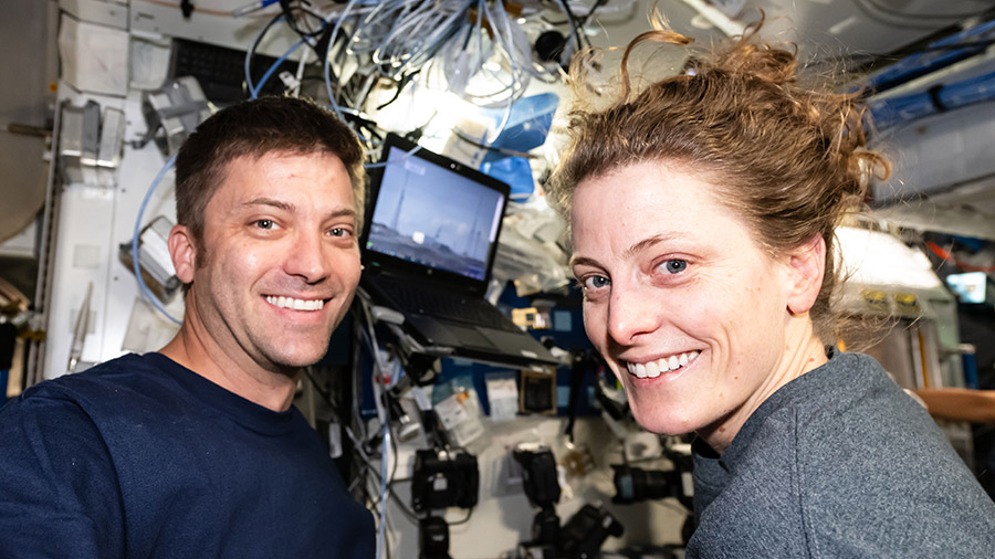 Astronauts Matthew Dominick and Loral O'Hara smile for a portrait shortly after the SpaceX Dragon cargo craft docked to the space station on April 23, 2024.