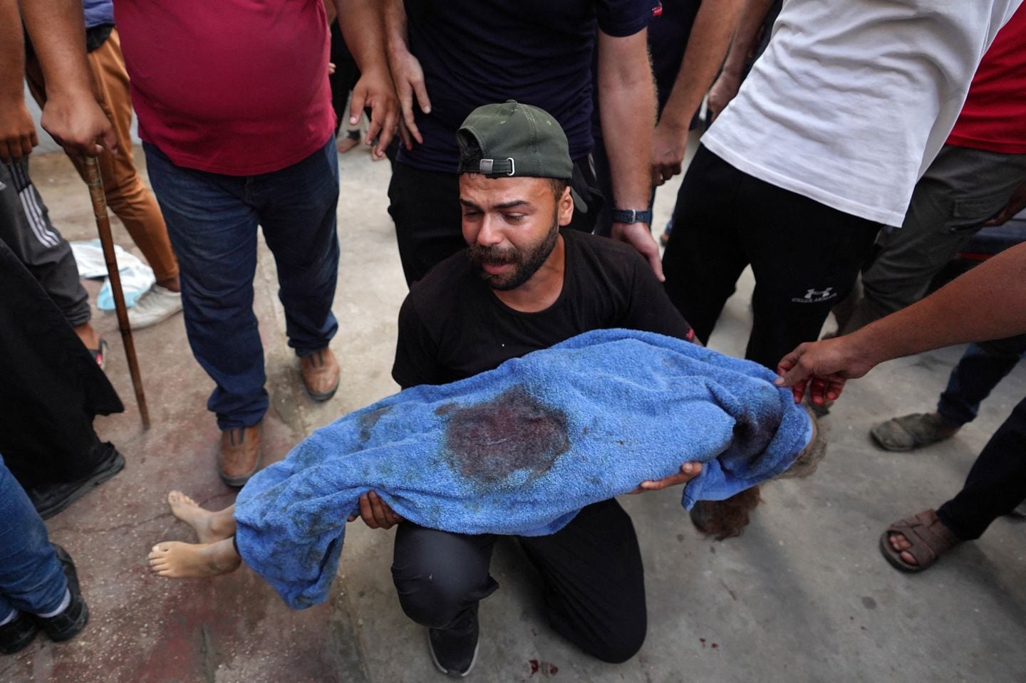 A Palestinian man mourned his relative, killed by an Israeli army strike the previous night, during a funeral at the Al-Aqsa Martyrs Hospital in Deir al-Balah in the central Gaza Strip on June 3.