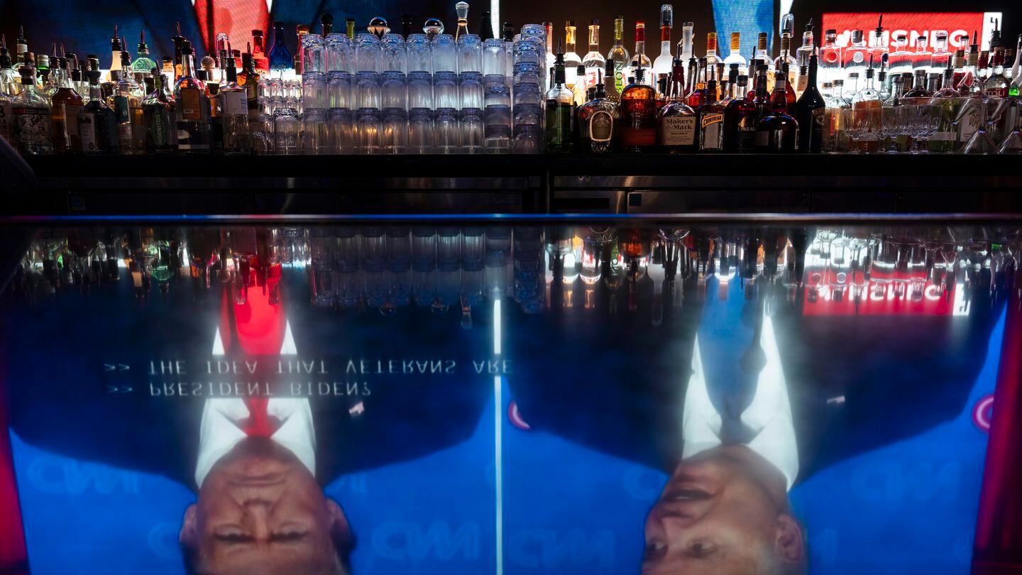 Liquor bottles were placed on a back bar at the Abbey Food & Bar in West Hollywood, Calif., on June 27, as a presidential debate between President Biden and Donald Trump was broadcast.