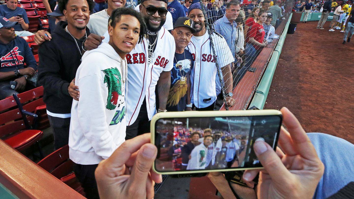 David Ortiz and D'Angelo Ortiz (front left) have spent many years at Fenway Park together.