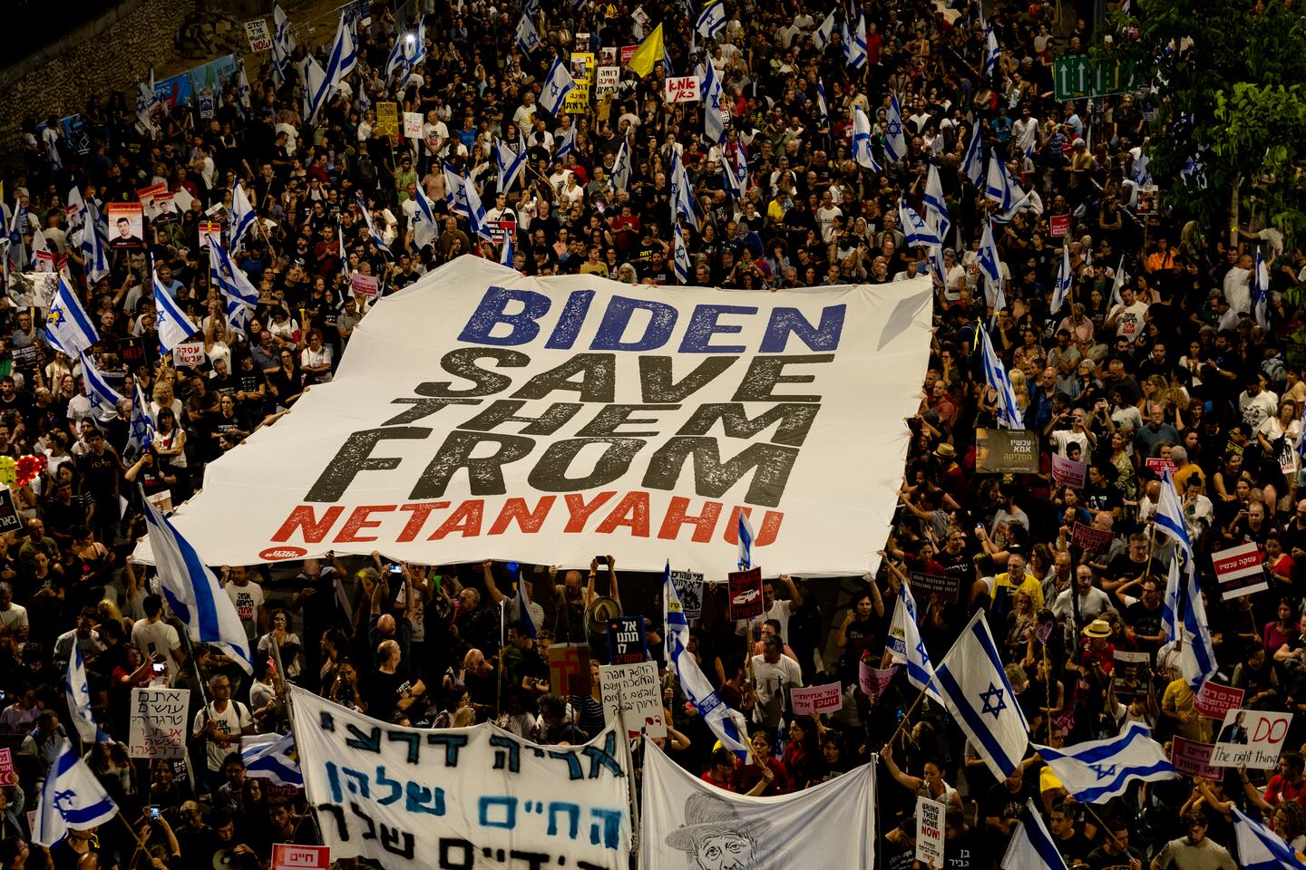 Protesters held signs and flags during a demonstration calling for a hostages deal with Hamas and against Prime Minister Benjamin Netanyahu of Israel and his government on June 1 in Tel Aviv. As Israel has pressed on with its military campaign in the southern Gaza Strip, the president of the country's closest ally, the United States, announced a new proposal for a potential cease-fire deal, saying "it's time for this war to end." 