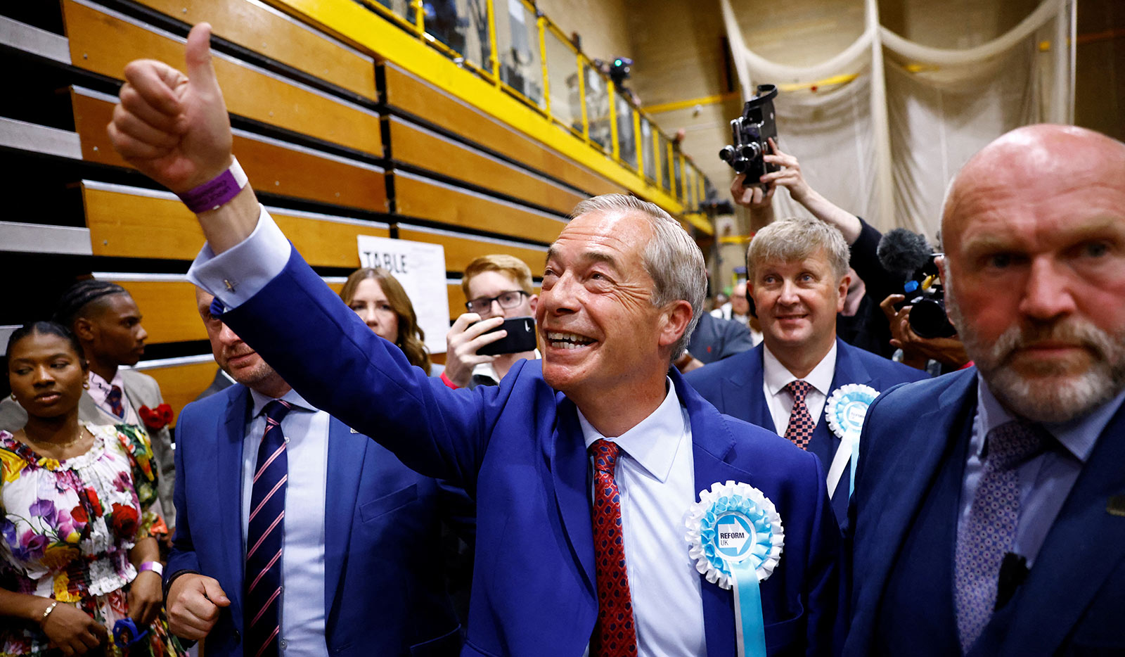 Nigel Farage gestures as he walks after winning his first seat in parliament during the UK election in Clacton-on-Sea - 5 July 2024