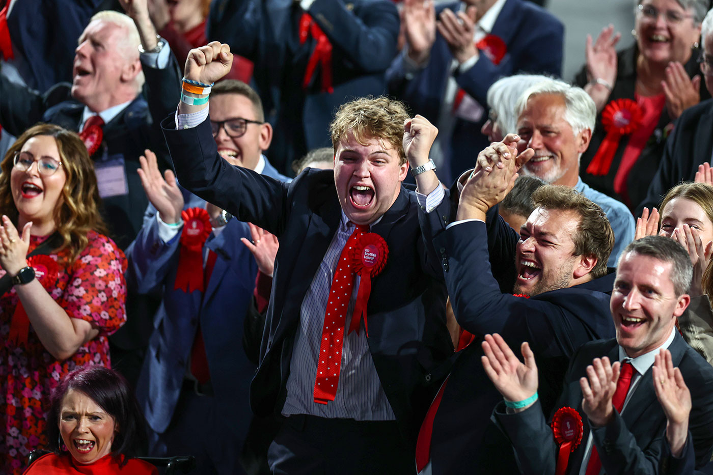 Scottish Labour supporters celebrate after the party scored victory in exit polls at declaration for Glasgow North East - 5 July 2024