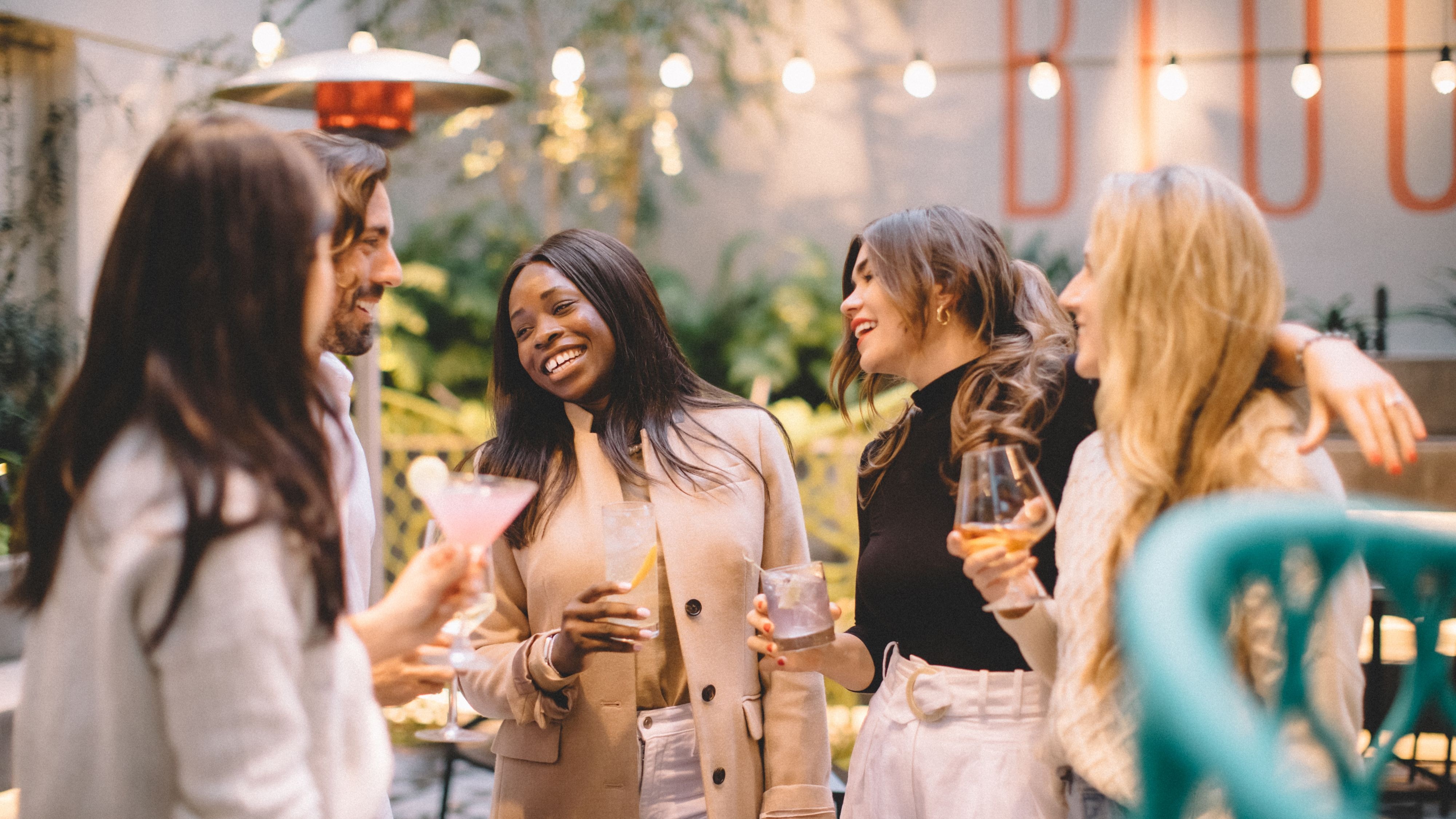 Group of friends enjoying cocktails