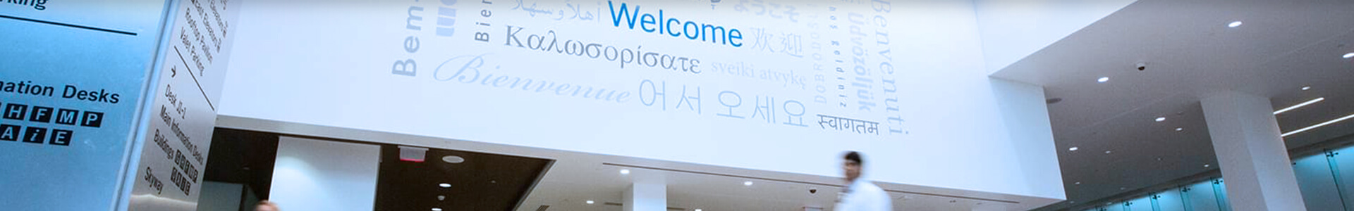 Photo of Hospital entrance with Welcome written in many languages