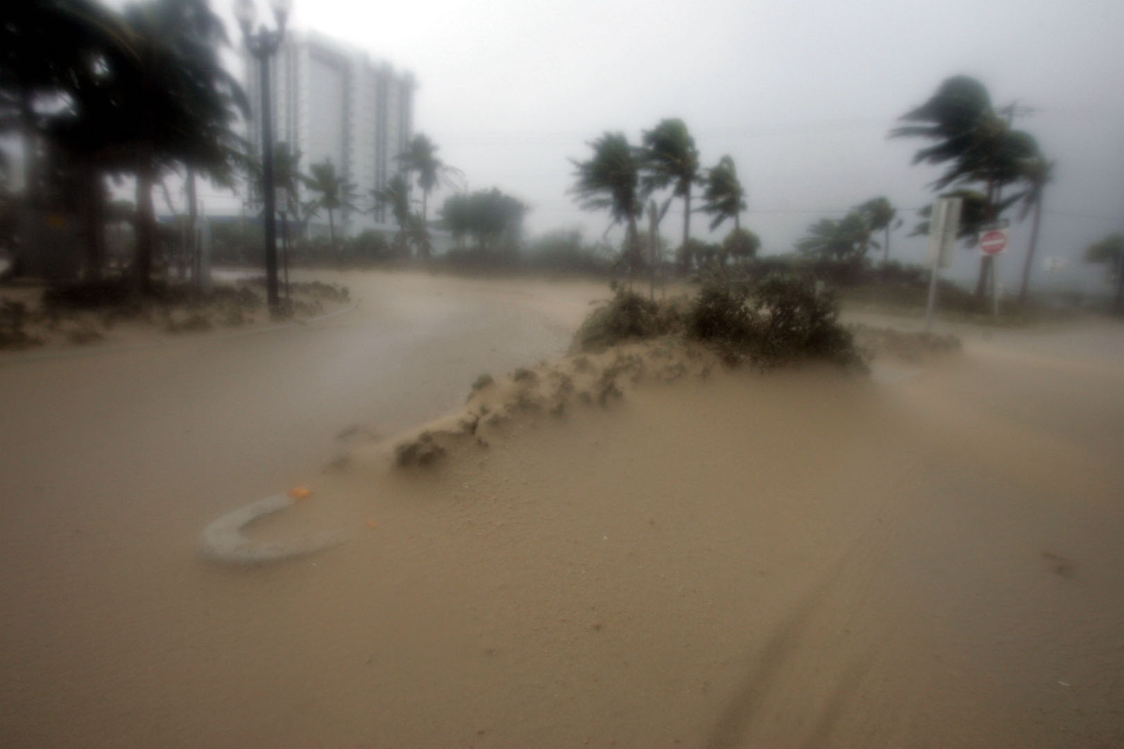 Sand is blown off the beach at Fort Lauderdale, Fla. late Thursday, Aug. 25, 2005 as Hurricane Katrina came ashore.