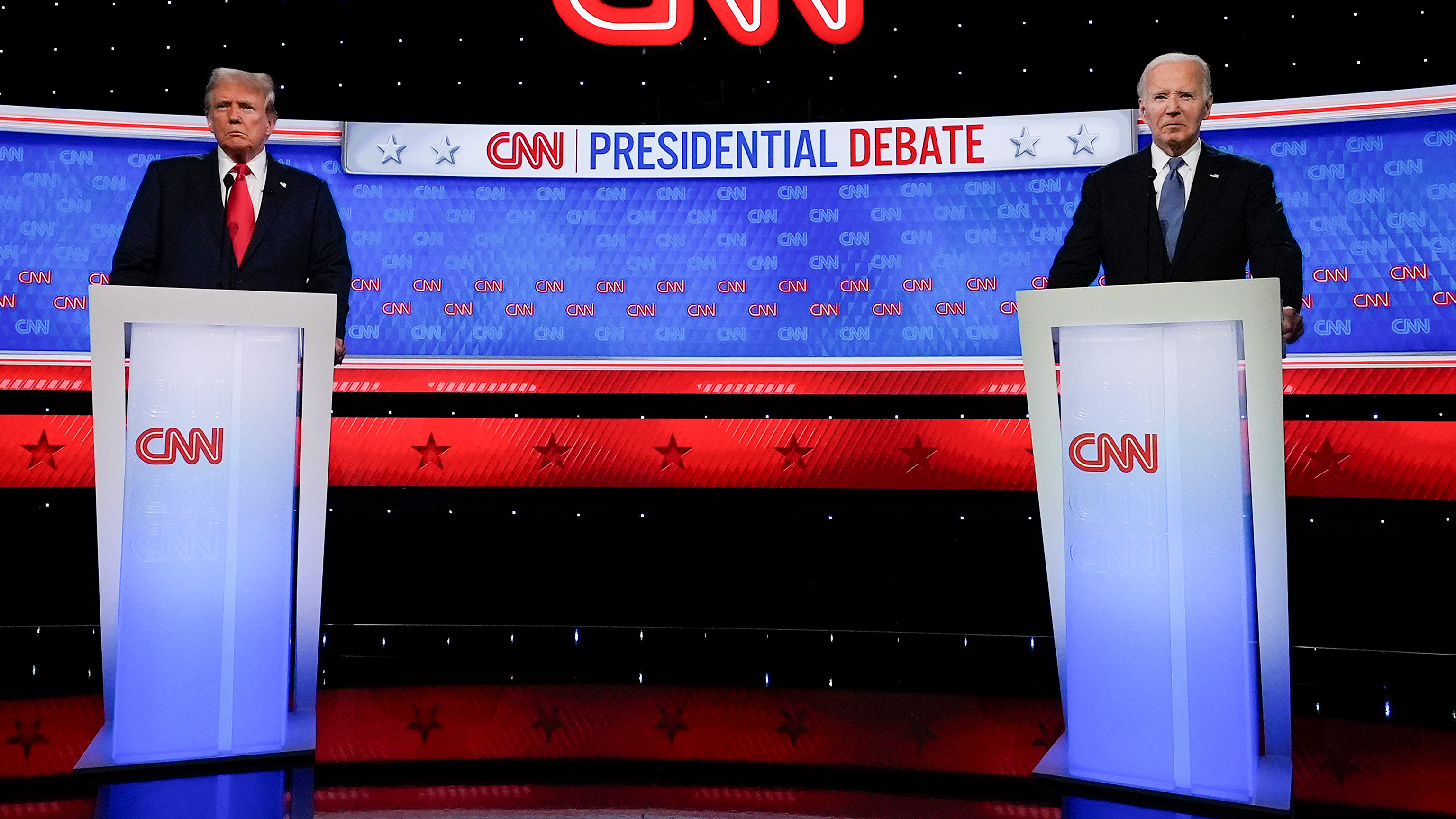 FILE - President Joe Biden, right, and Republican presidential candidate former President Donald Trump, left, stand during break in a presidential debate hosted by CNN, Thursday, June 27, 2024, in Atlanta. 