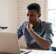 Man looking at a laptop computer