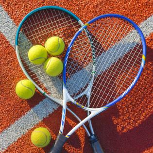Tennis rackets with tennis balls