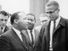 Martin Luther King, Jr. (left of centre) and Malcolm X (right) waiting for a press conference, 1964.