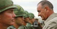 Vietnam War. U.S. President Lyndon B. Johnson awards the Distinguished Service Cross to First Lieutenant Marty A. Hammer, during a visit to military personnel, Cam Ranh Bay, South Vietnam, October 26, 1966. President Johnson