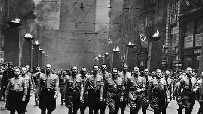 Adolf Hitler participating in a Nazi parade in Munich, Germany, circa 1930s.