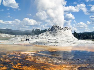 Castle Geyser, Yellowstone National Park, Wyoming. (steam; water pressure)