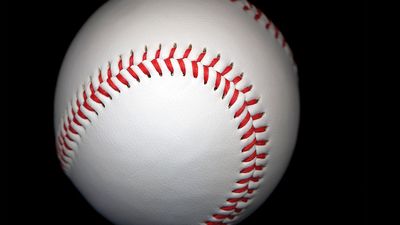 Close-up of Baseball on black background. Baseball Homepage blog 2010, arts and entertainment, history and society, sports and games athletics