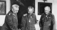 Meeting of leaders in W.W.I, General Hindenburg, Kaiser William II, General Ludendorff examine maps during World War I in Germany.