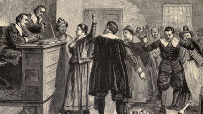 Salem Witch Trials. A women protests as one of her accusers, a young girl, appears to have convulsions. A small group of women were the source of accusations, testimony, and dramatic demonstrations.