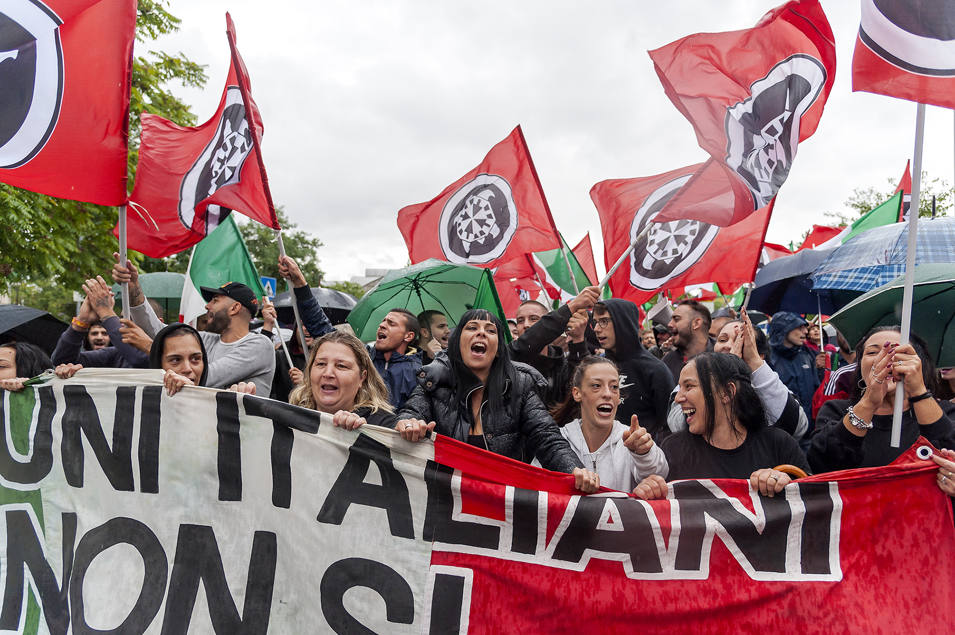 Demonstrators from the Italian far-right movement CasaPound rally during an anti-immigration protest i