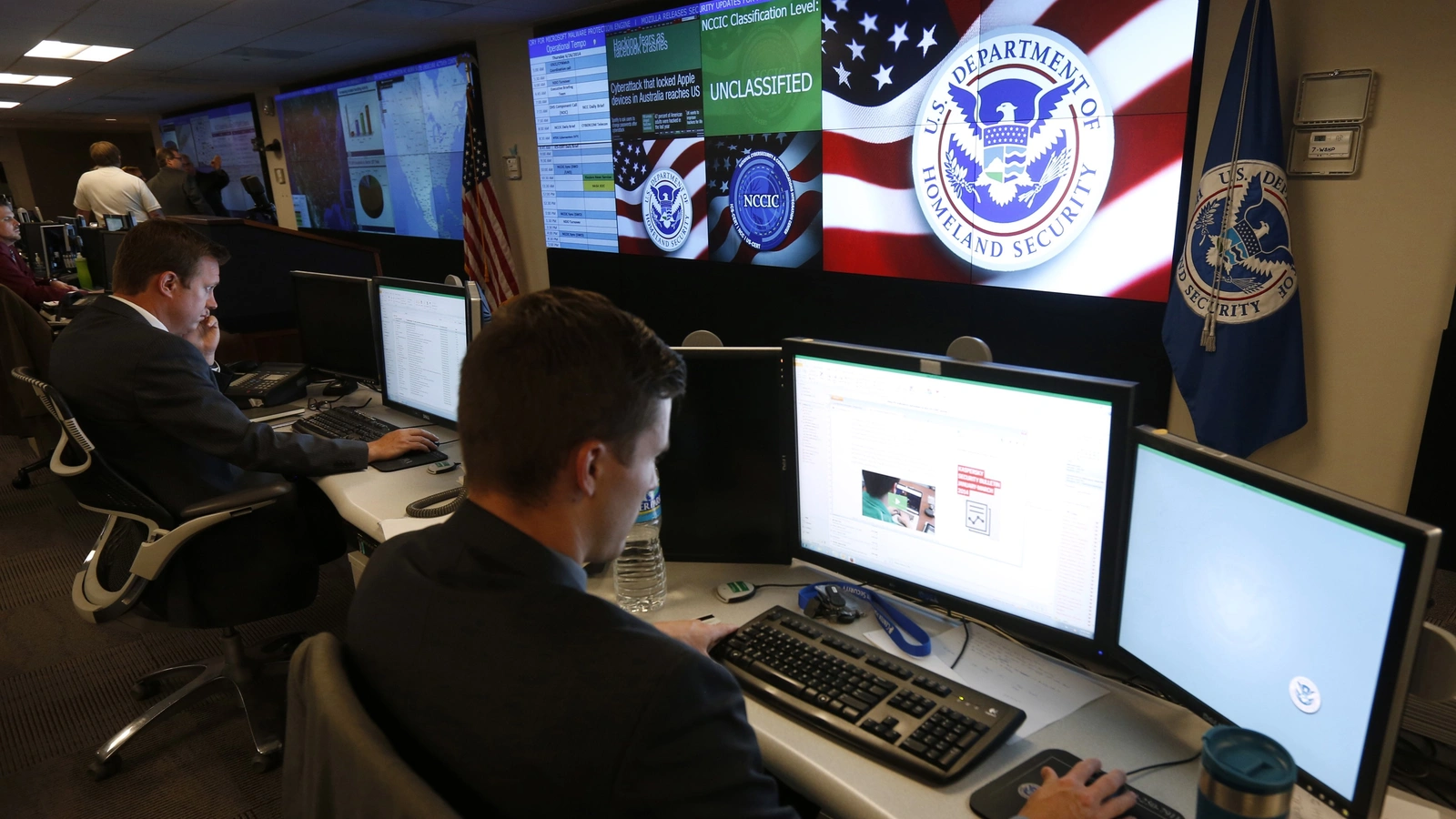 U.S. Department of Homeland Security employees work inside the National Cybersecurity and Communications Integration Center in Arlington, VA.