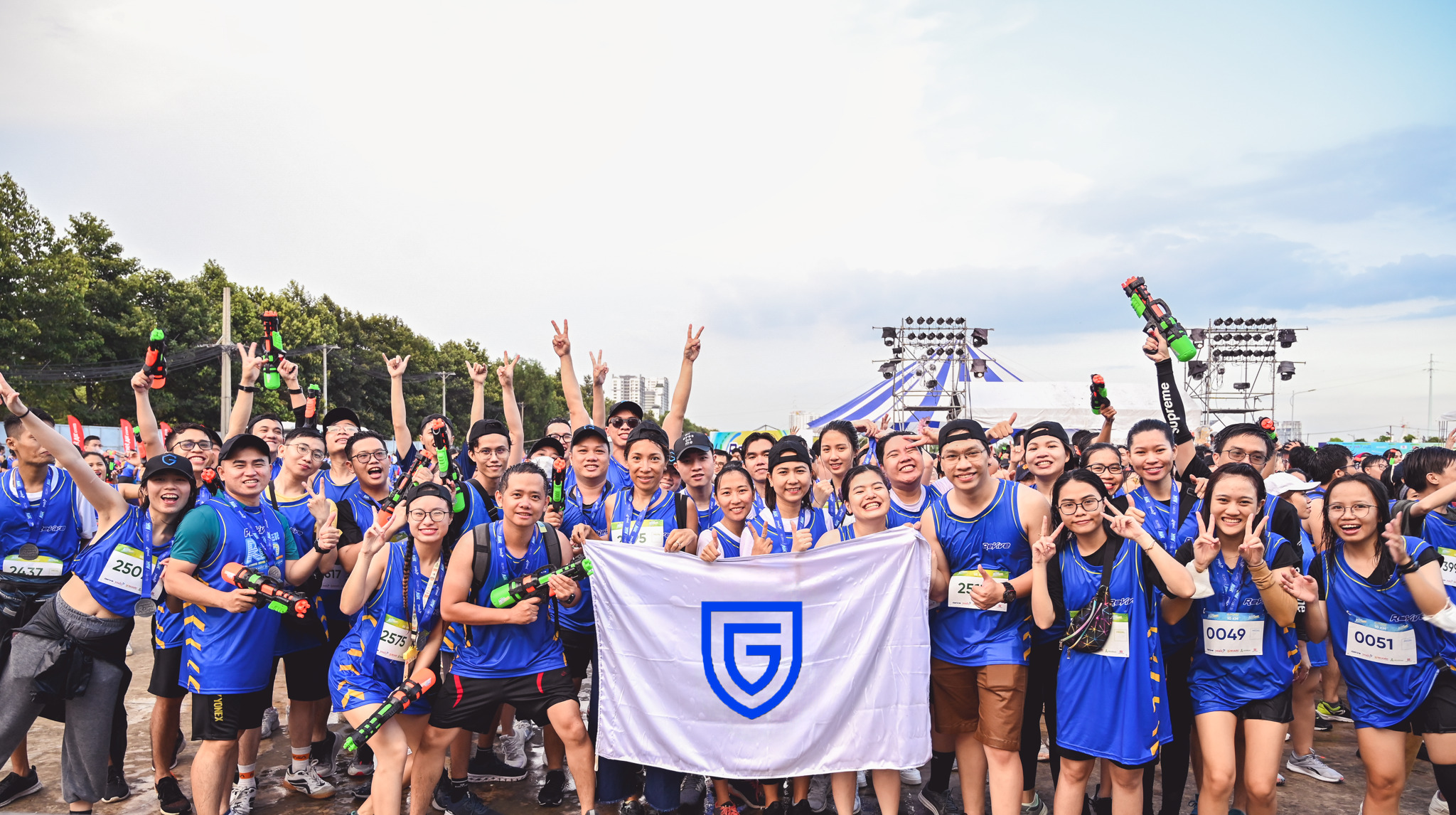 Vietnam team holding flag with GeoComply logo