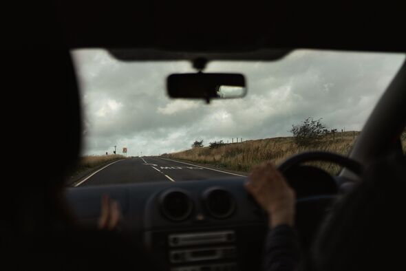 UK road seen through car windscreen