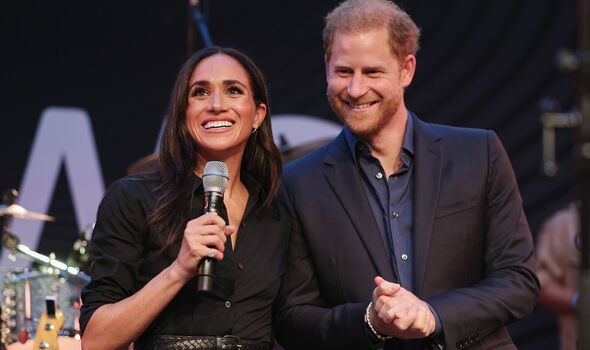 Harry and meghan smiling